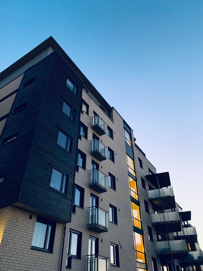 Modern apartment building with comprehensive insurance coverage
